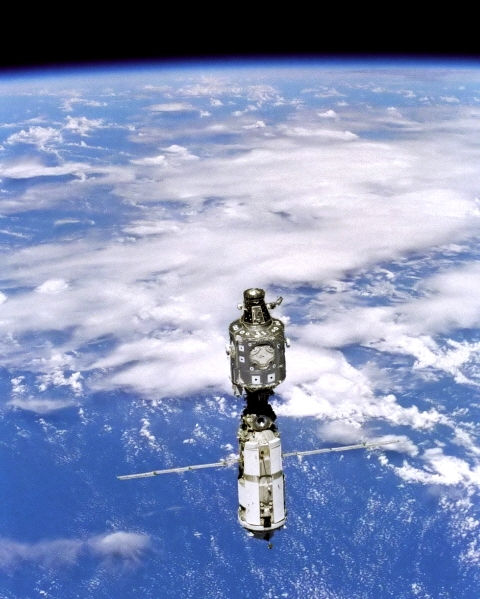 International Space Station (ISS) above Earth from Discovery