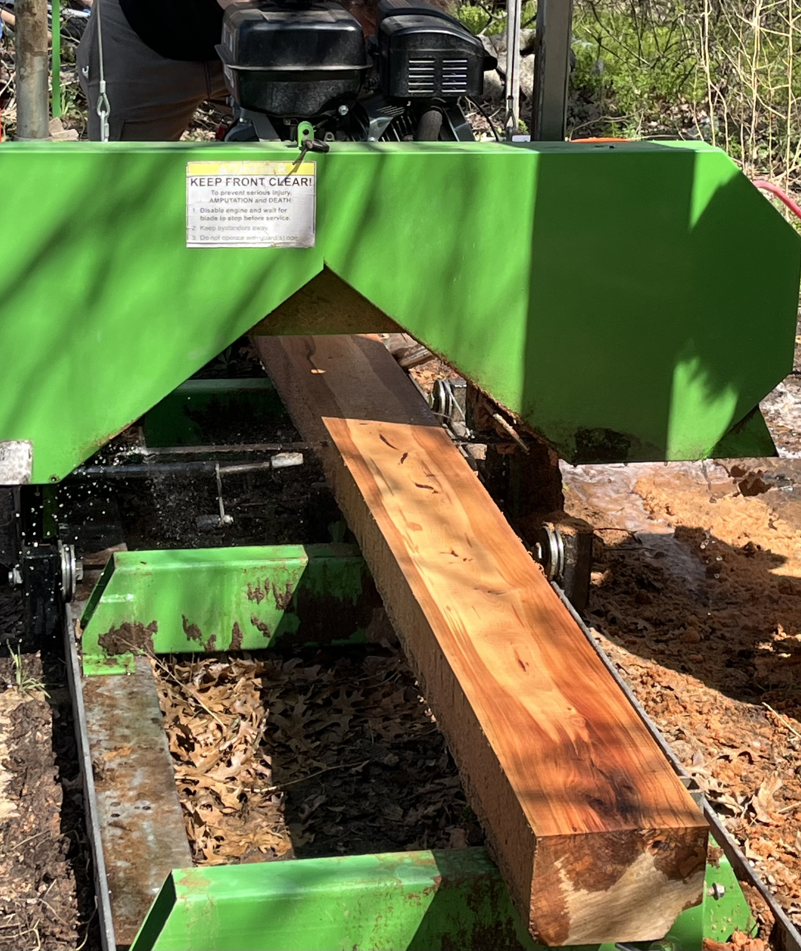 sawmill cutting a beam