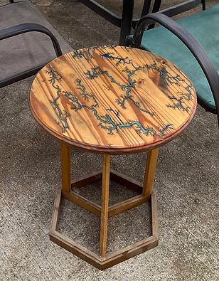 Round wooden table, patterned top, hexagonal base