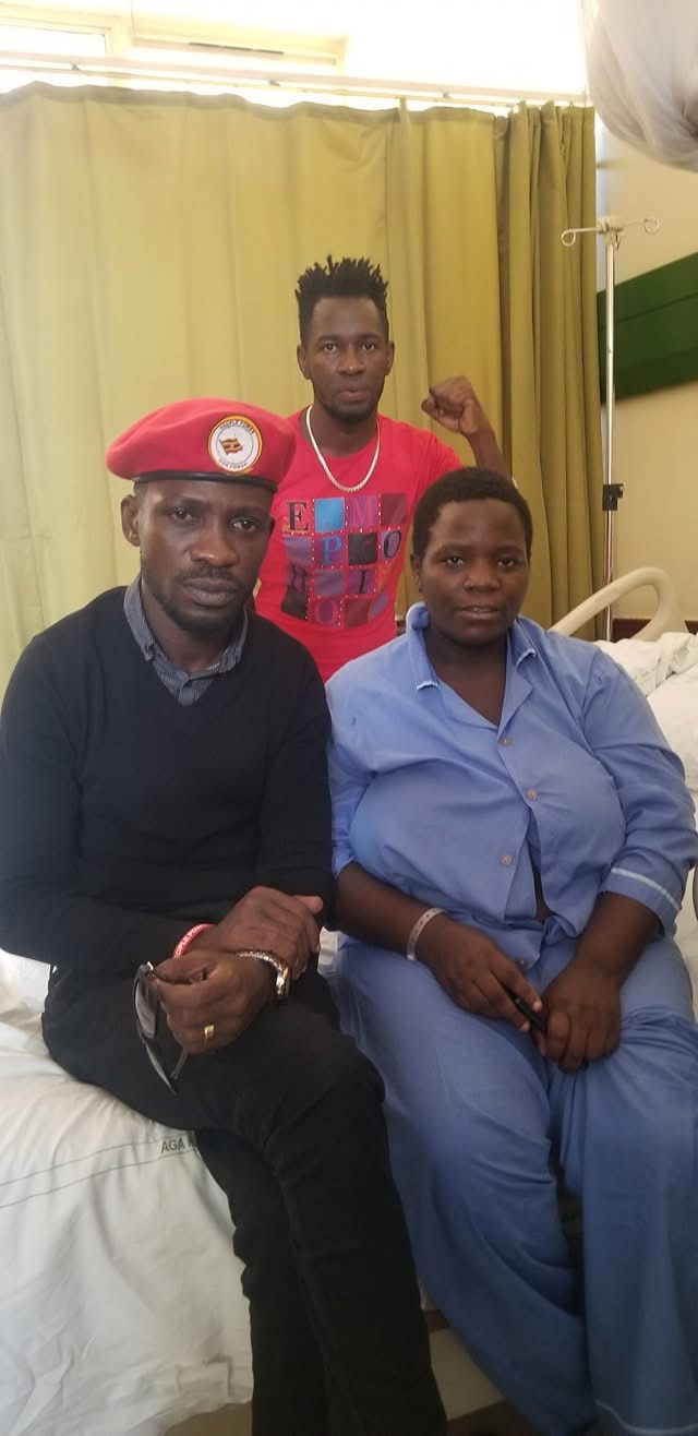 Bobi Wine and Nubian Li pose with Sauda Madada at Agha Khan Hospital, Nairobi. They had gone to visit her