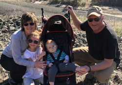 Sue Tidwell, her husband, and two grandchildren above the Salmon River.