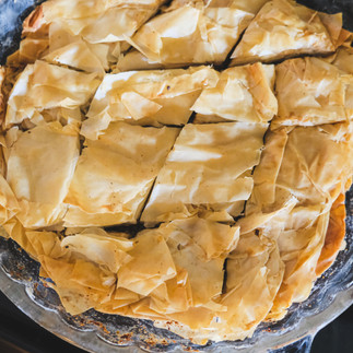 Baked baklava with the sugar syrup poured on top