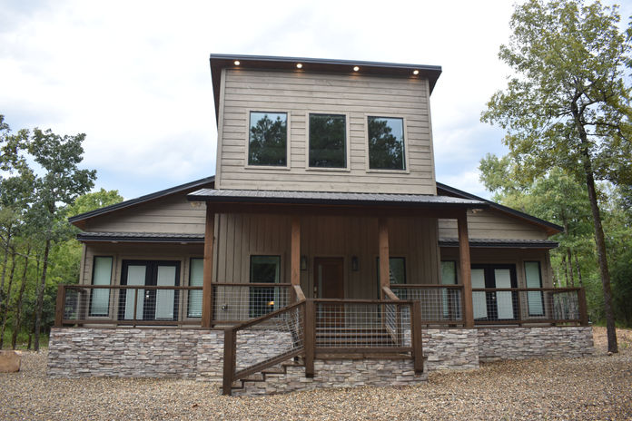 Large cabin with Crockett Rustic Qwik Stack wainscotting.
