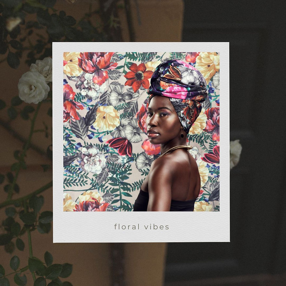 Woman in a floral prints with a floral print background.