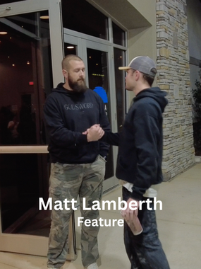 Guy dapping up another guy. "Matt Lamberth Feature"