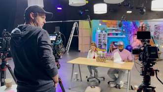 Guy behind the camera filming Ricky and Jayme from The Loop Show
