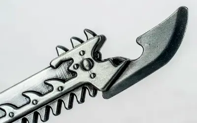 Miniaturbild: Flaschenöffner Chaos Chainsword von Warhammer 40000