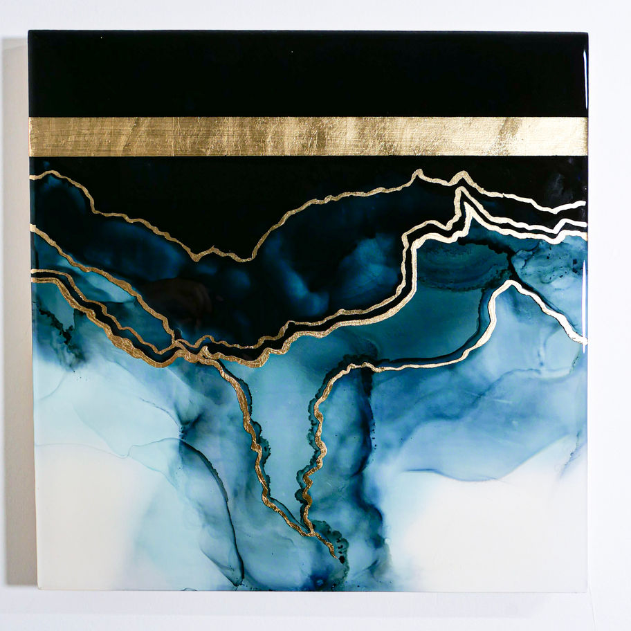 Front View of abstract blue and black alcohol-ink painting with electric 24k gold accents by Stephanie Gillett
