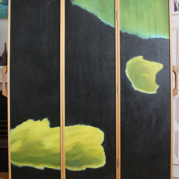 painted room divider screen
with night sky one side and topiary trees on other side