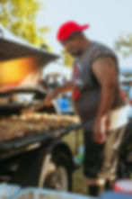 Nick working the grill Tailgating at the Spelhouse Homecoming