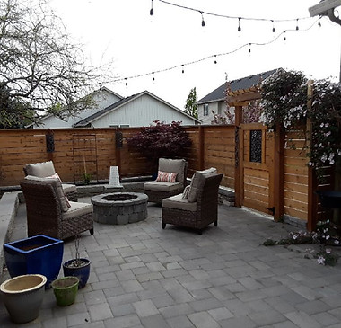 Custom cedar horizontal fence with custom gate and pergola built in. 