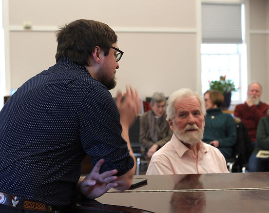 Kearsarge Chorale Artistic Director Alex Ager confers with Founding Director David Almond (c) 2024 Patsy Catsos