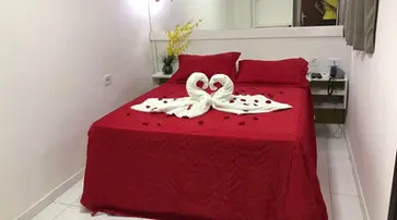 Quarto com cama na Pousada dos Cabanos 14
