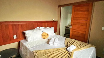 Quarto com cama no Kaha Mar Patacho