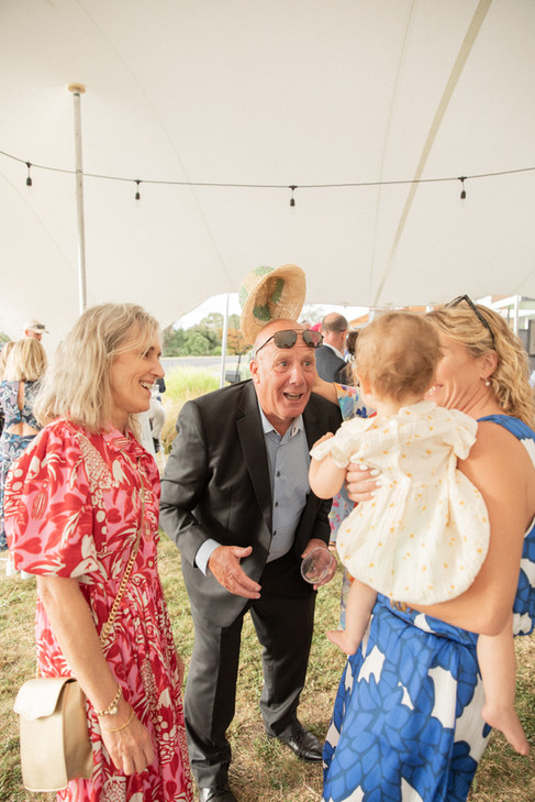 Wedding guests mingling at cocktail hour