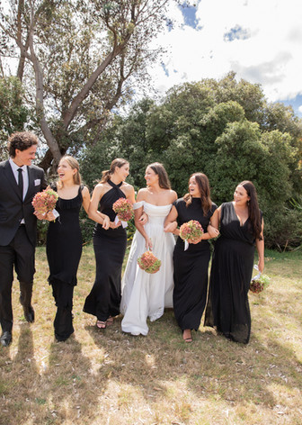 Bridesmaids candidly walking together
