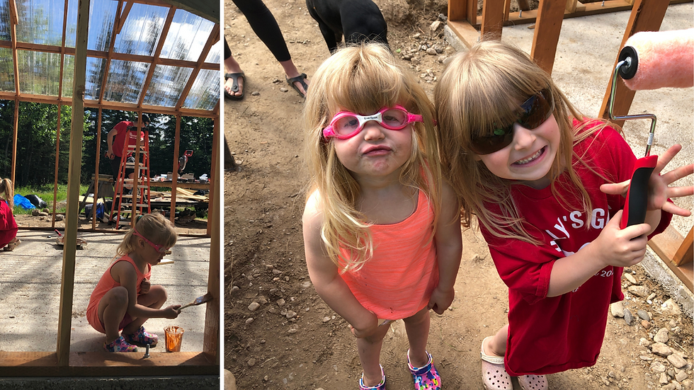 a family builds a greenhouse in interior Alaska with raised beds for producing harvest in zone 2&3