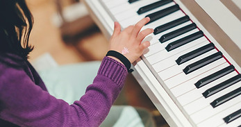 kids playing piano.jpg