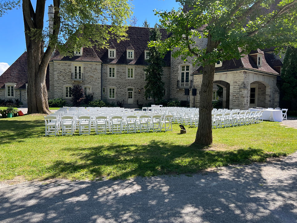 Eye-level view of Eaton Hall's grand entrance with manicured gardens