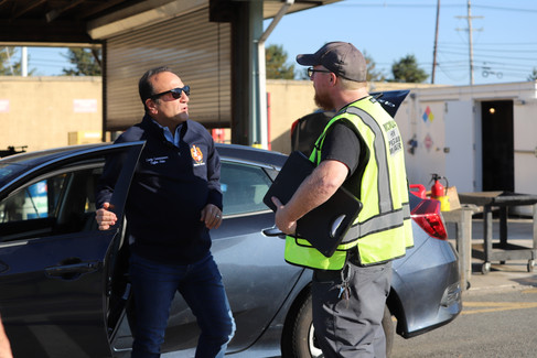 MUA employee and officer talking