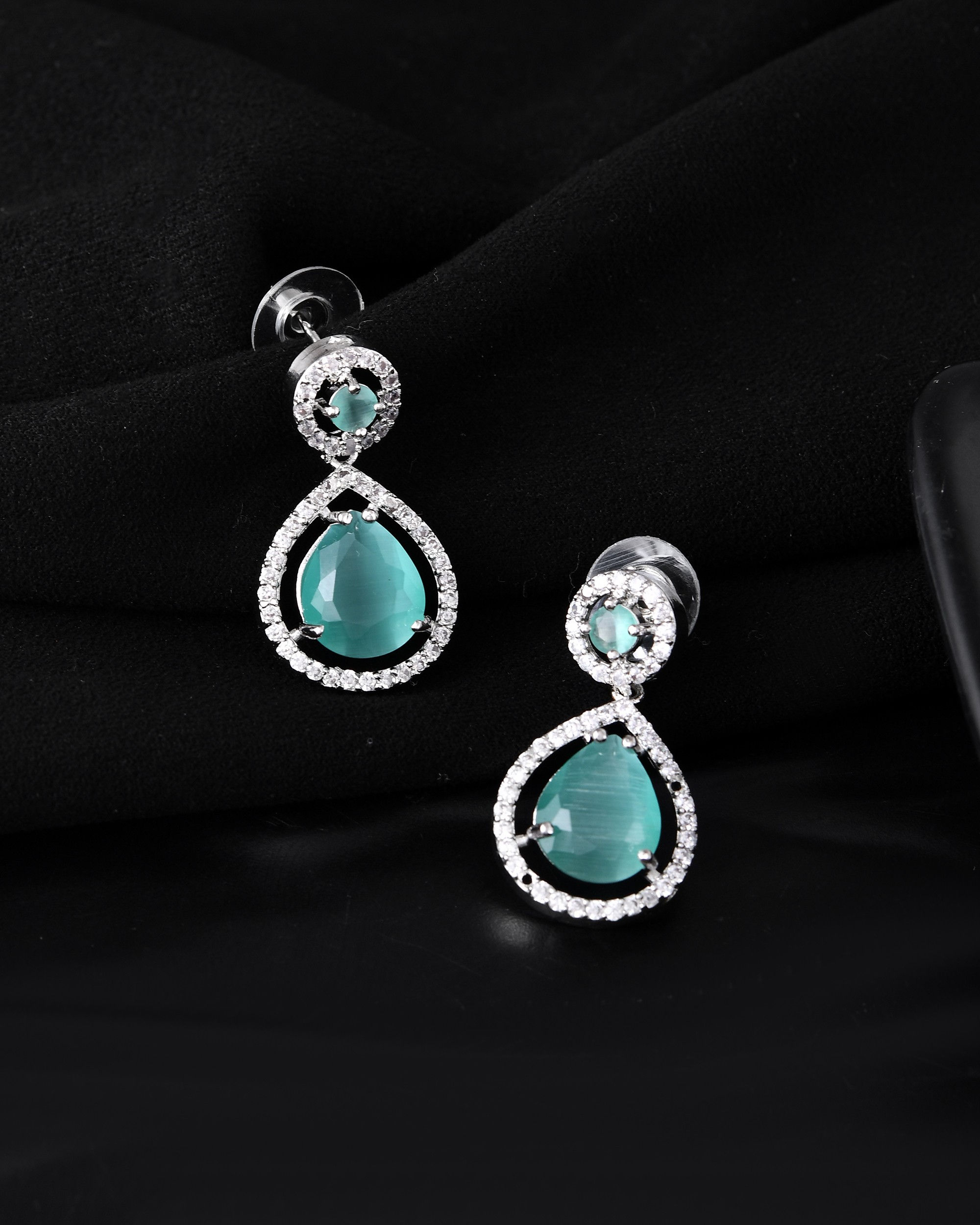 Silver Plated Sea Green Stone Studded Teardrop Shaped Earrings