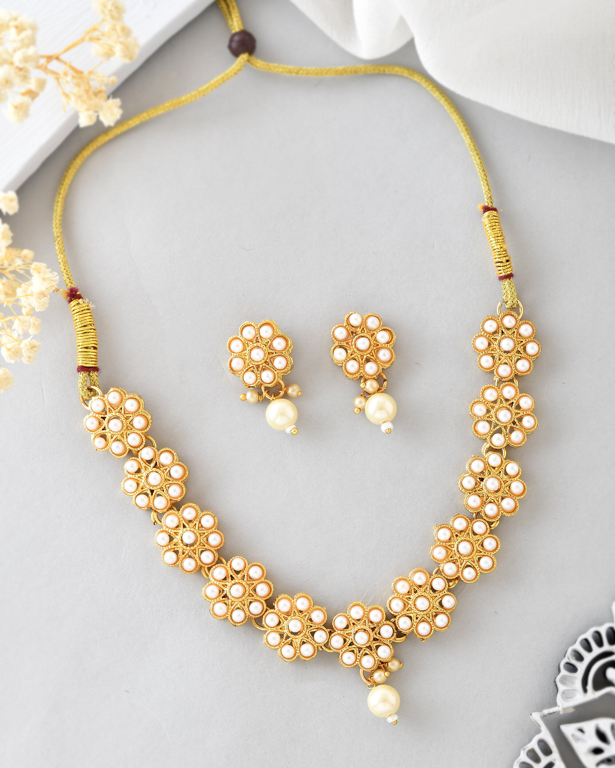 Gold Plated Pearl Studded Floral Necklace And Earrings