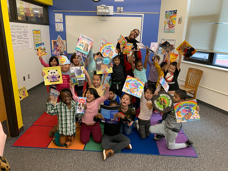 Having fun showing off their books.jpeg