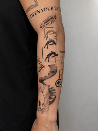 Black and grey geometric sleeve tattoo featuring surreal figures, abstract stairs, galaxies, and fine line details on the forearm at White Sloth Tattoo Shop in Tamarindo, Costa Rica.