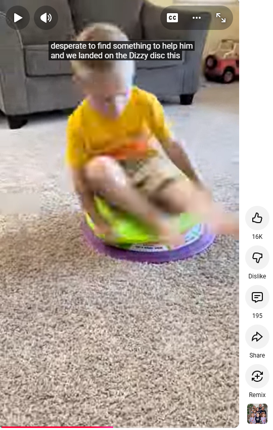 Young child in yellow shirt spins on a green and purple Dizzy Disc on carpet. Text overlay reads: "desperate to find something to help him."