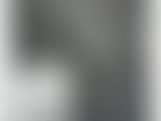 Grayscale photo of a student in a hallway using a lower-body protective stance beside a trash bin; caption reads Figure 15.13.