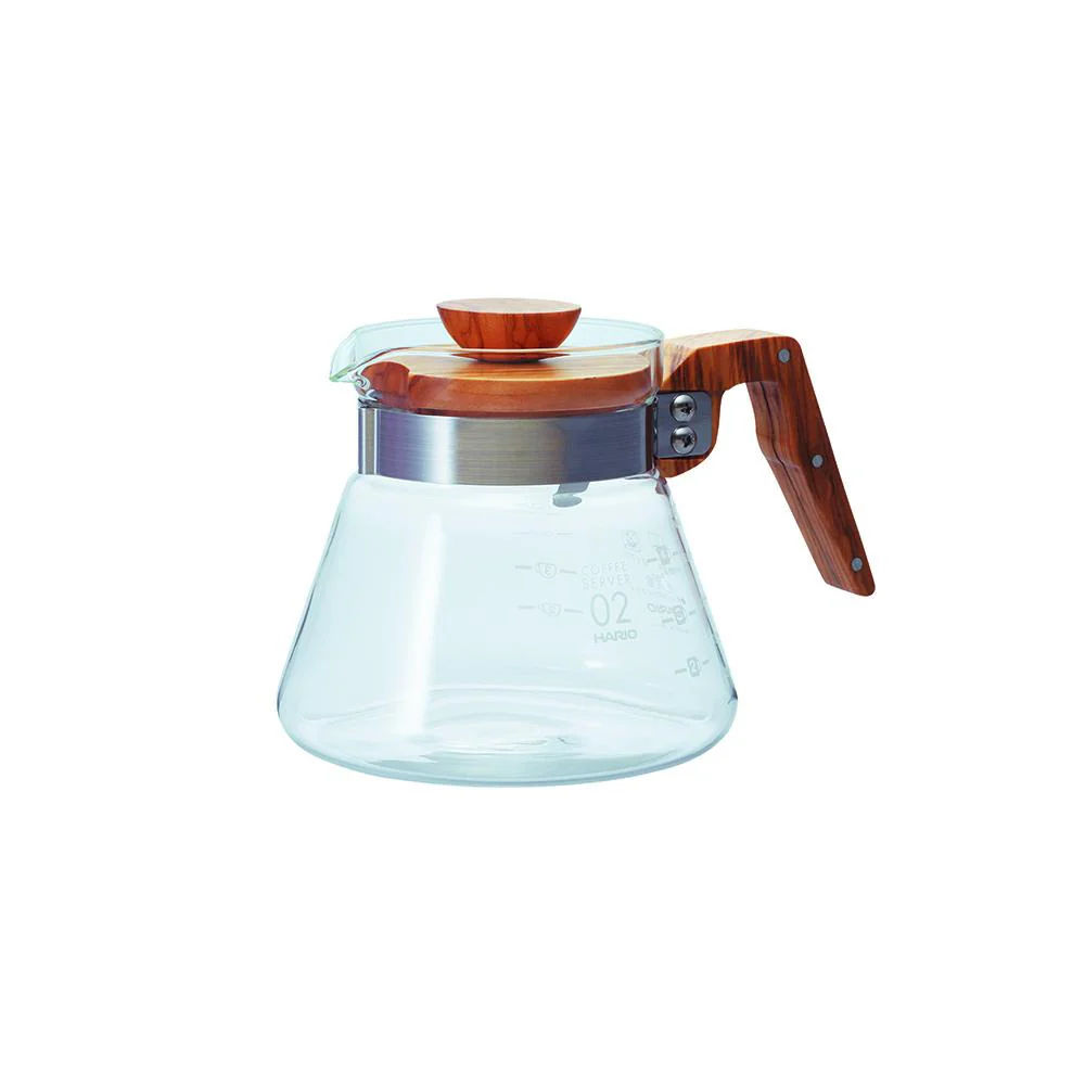 Hario glass coffee server with a wooden handle and lid, featuring measurement markings.