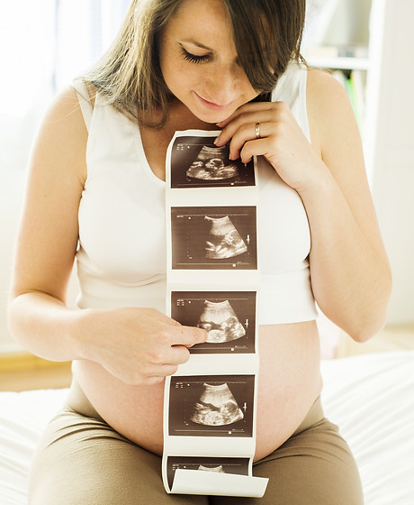 graphicstock-beautiful-pregnant-woman-ho