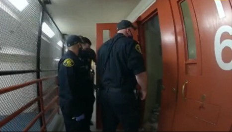Santa Rita guards entering Maurice Monk’s cell after he was unresponsive.