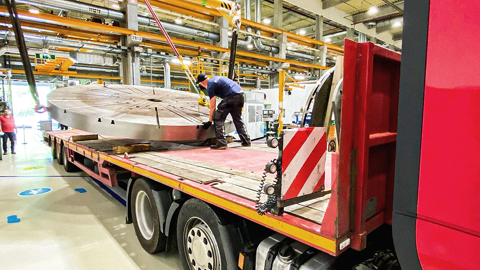 Oversized cargo lifted using crane for export transport