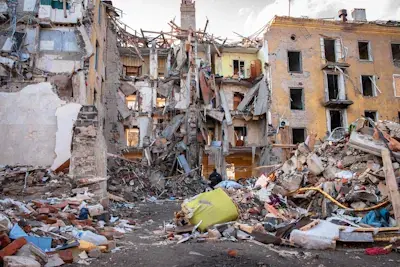 Two apartment buildings damaged by bombings.