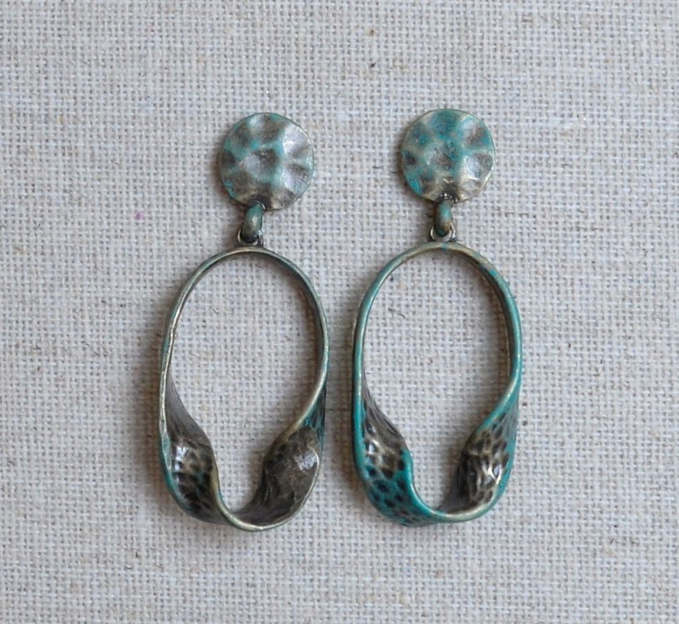 Thumbnail: Half swirl oval earrings