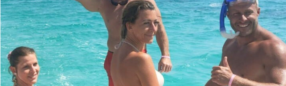 Two couples preparing for snorkeling on Thunder 1 during a private speed boat trip in Hurghada, Red Sea