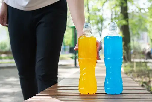 person grabbing Gatorade