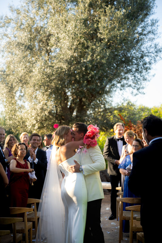 Wedding ceremony kiss after ceremony at Finca Sonrisa Mallorca.