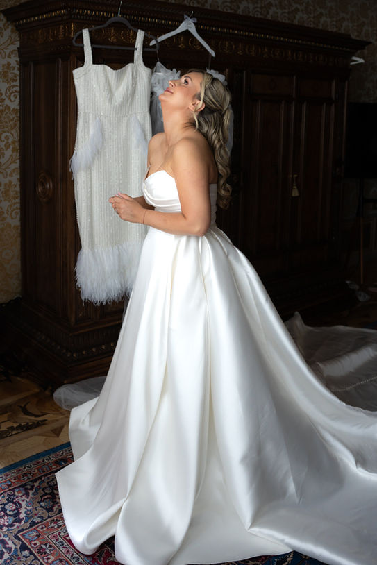 Bride posing in her wedding dress inside Villa Fiordaliso