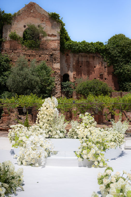 White floral ceremony design at Marbella destination wedding