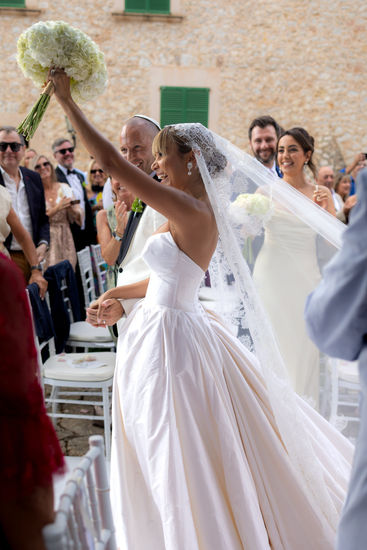 Bride celebrating after ceremony at Son Berga wedding Mallorca