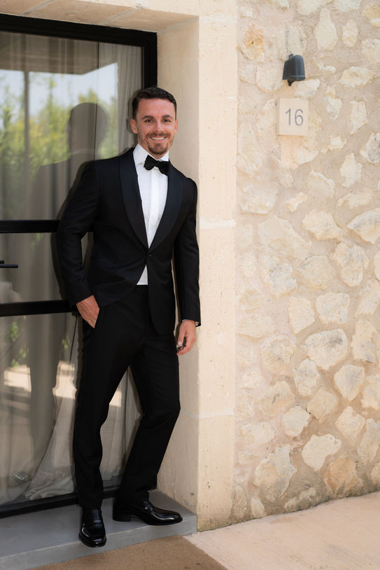 Groom standing outside Finca Serena Mallorca wedding venue