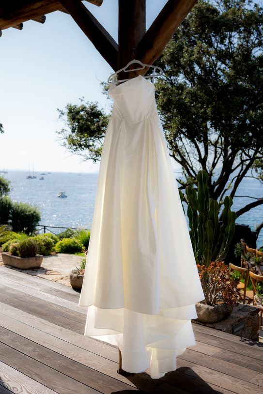 Wedding dress hanging during bridal preparations in Ajaccio Corsica.