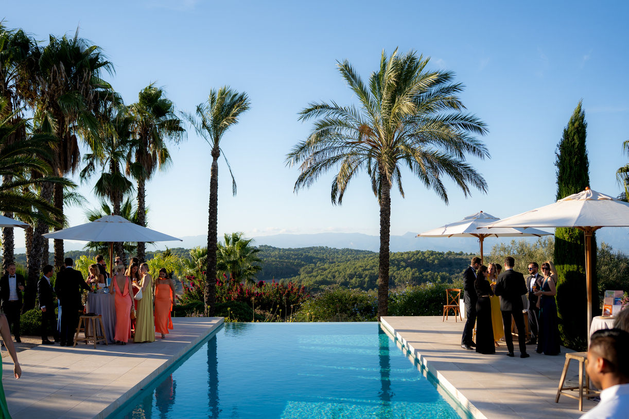 Cocktail hour by the pool during wedding reception at Finca Sonrisa Mallorca.