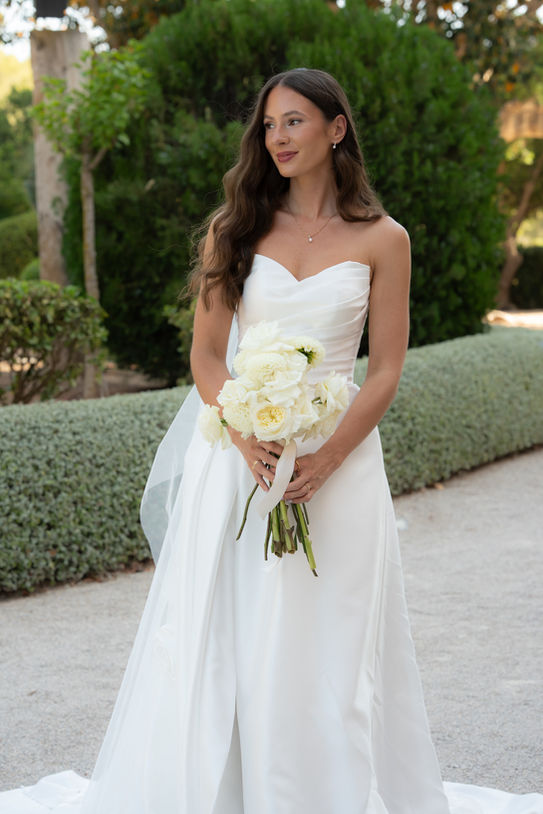 Bride holding bouquet during Mallorca destination wedding.