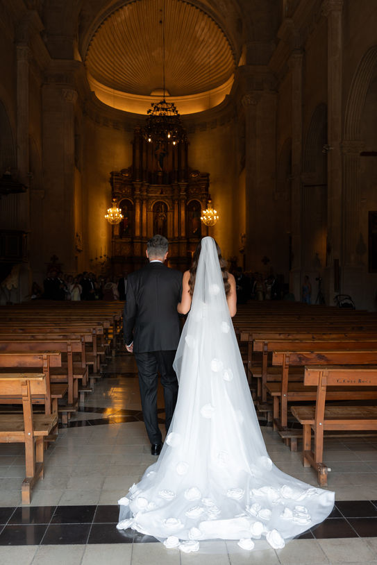 Bride and groom during church ceremony in Mallorca.