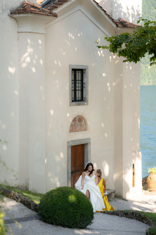 Bride and mother arriving at chapel on Lake Como