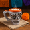 Thumbnail: Traditional Talavera Day of the Dead Skull Mug | Lavender & Orange Color