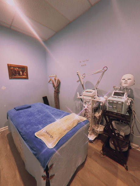 Massage Spa room with massage bed